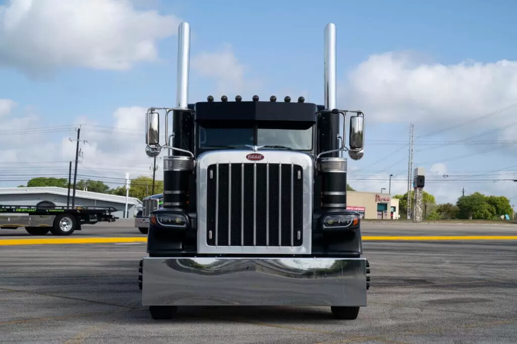 A front-view photo of a black truck